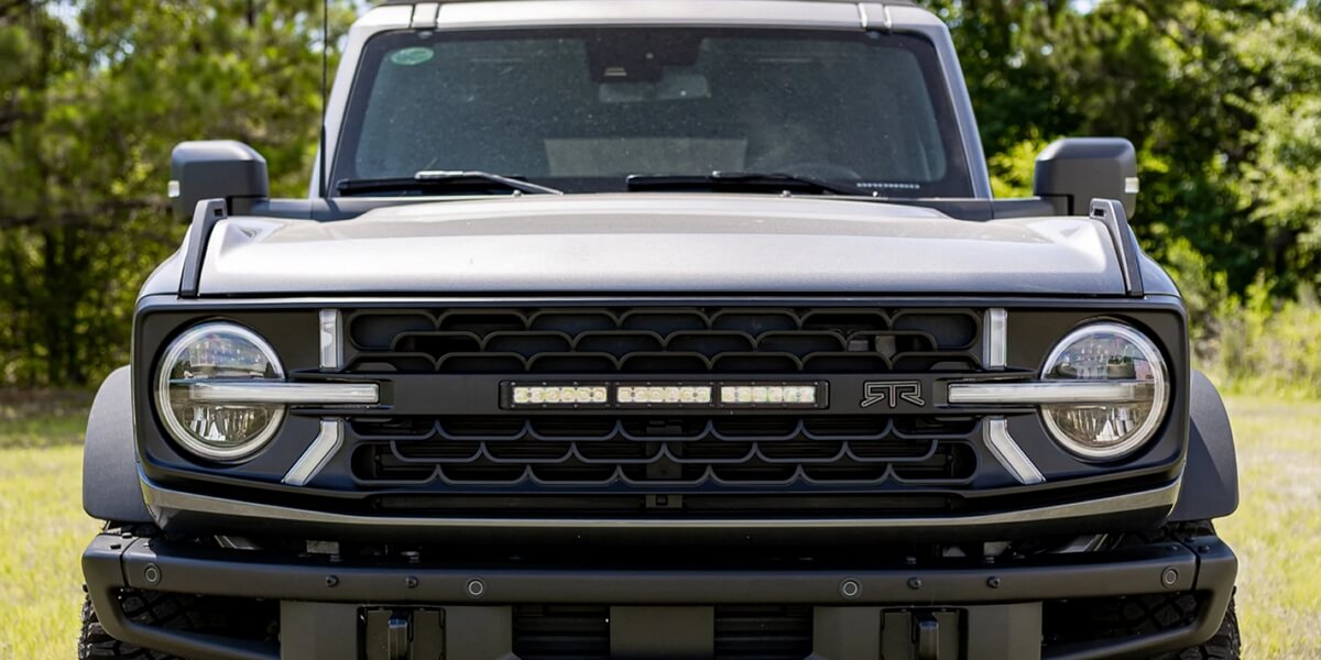 led grille on a car with aftermarket headlights