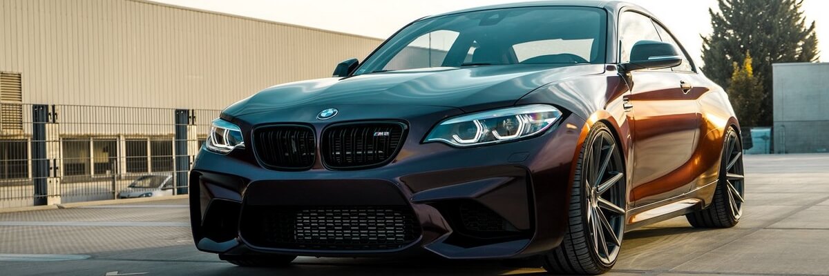 BMW 2-series with a set of custom rims