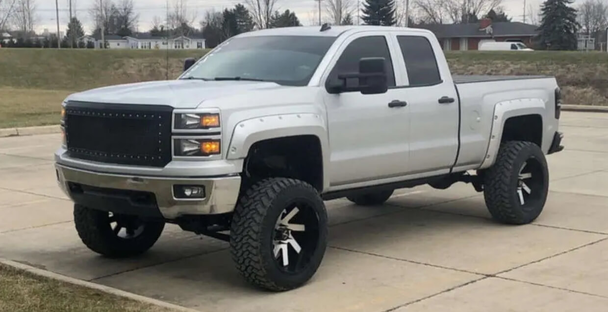 Chevy Silverado with a black mesh grille by Trex